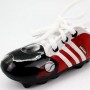 Hucha zapatilla de fútbol en color rojo con cordones ideal como regalo o detalle para niños