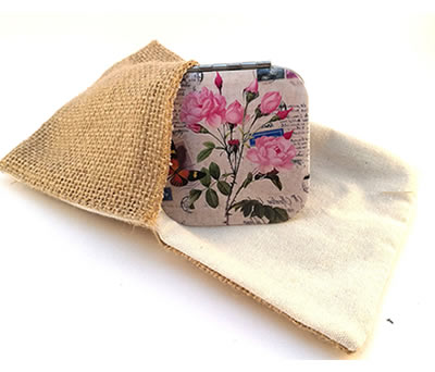 Portatodo jute corazón con espejo de aluminio vintage modelo flores para las invitadas de tu boda o evento