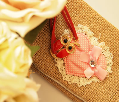 Portatodo jute saco corazón con pulsera buhos