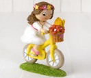 Figura pastel niña comunión en bici