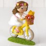 Figura pastel niña comunión en bici