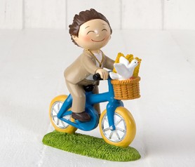Figura pastel niño comunión en bici