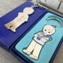 llavero marinero metálico personalizado con nombre y fecha de comulgante como detalle para los invitados