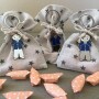 montaje de llavero comunión con bolsitas de estrellas y caramelos de colores como detalle para los invitados de tu comunión