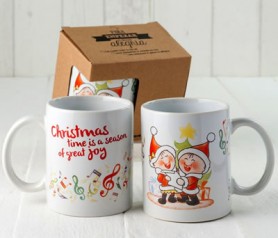 Taza cerámica navideña niños cantanto villancicos como regalo de navidad