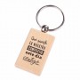 Llavero de madera como detalle de boda para invitados con inscripción que suerte la nuestra